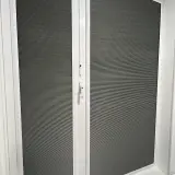 Шторы блэкаут с электроприводом на окне